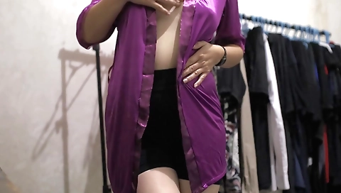 Indian hairdo blonde shows off a sexy dress and lingerie
