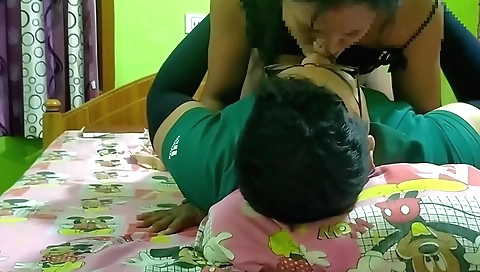 Indian brunette gets on her knees on a bed to ride a cock