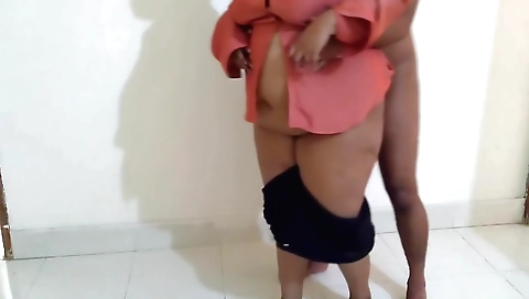 Gorgeous Indian lady in white shirt and black skirt