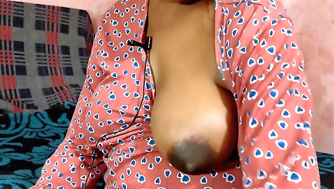 Sexy lingerie brunette in the bedroom shows her tits