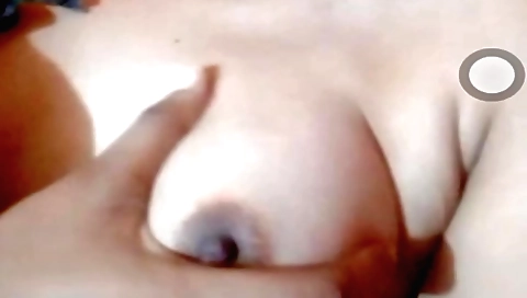 Amateur brunette shows off her big tits in solo video