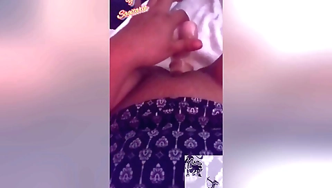 Indian amateur with a nice face is giving a handjob