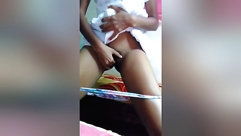 Horny brunette in a white dress and a black top with a hairy pussy