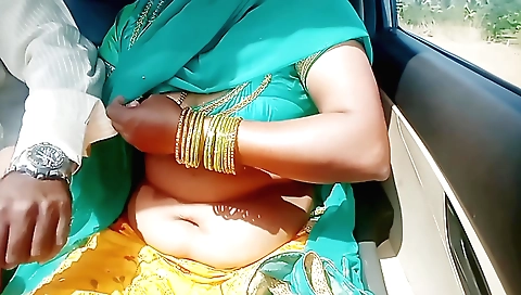 Indian brunette in sexy clothes is having sex in the car
