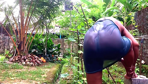 Sexy Indian desi bhabhi outside bathing and flashing neighbor