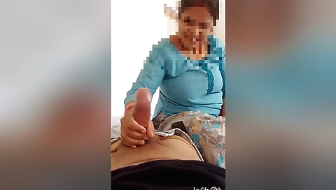 Hot brunette handjob on a camera by her stepsister