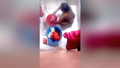 Indian milf showing off her sexy body in a bathing room