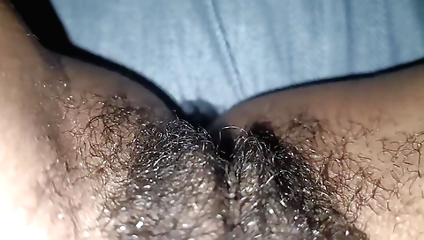 Indian hairy woman in a hairy pussy in this solo video
