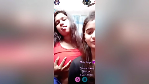 Lesbian webcam show with a brunette girl with big tits