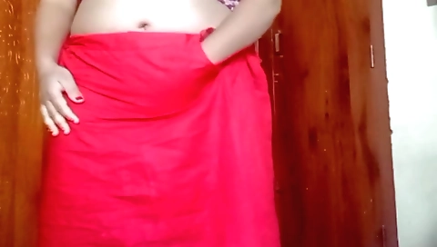 Sexy Indian chick with large natural tits sucks her fingers
