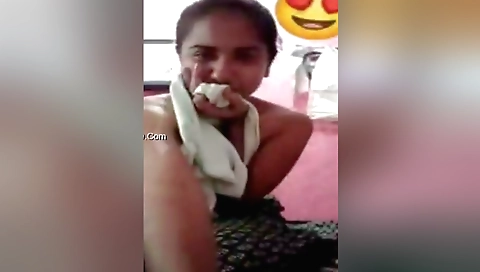 Indian brunette girl in a sexy outfit makes a solo video