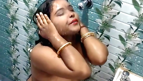 Busty brunette girl has an amateur sex in the shower
