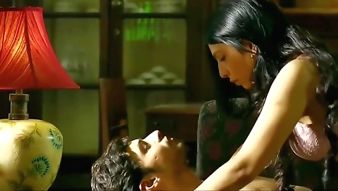 Indian brunette babe enjoys sex with her man in the movie