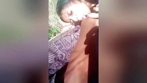 Indian brunette girl showing off her body outdoors