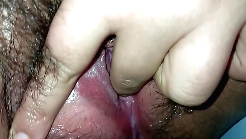 A hot girl in the bed is in the mood to let her pussy get wet