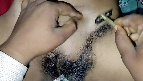 Indian woman is playing with her hairy pussy in pov