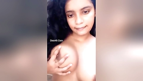 Indian teen shows off her big boobs in a solo video