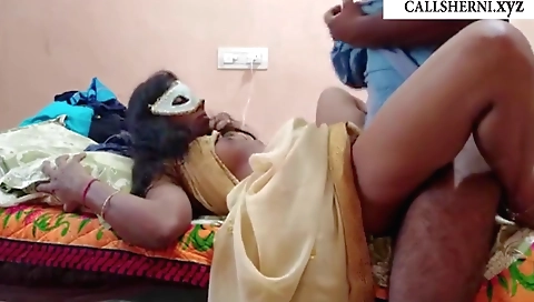 Indian blonde in a sexy white blouse and black stockings