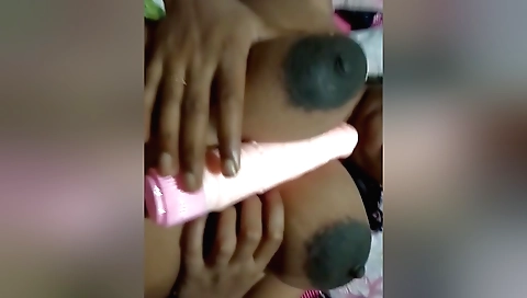 Sexy brunette is showing her nice tits in a solo clip