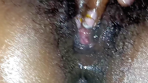 Indian girl with hairy pussy toys with her favorite dildo