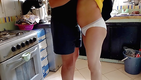 Slutty housemaid in a tight white dress on web cam