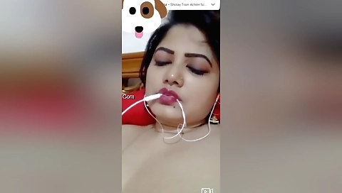 Indian bhabhi is getting her pussy pounded by a dildo