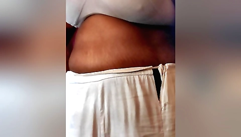 Indian big boobed girl wearing a nice dress in solo video