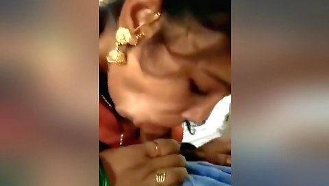 Milf gives a blowjob to her husband in the bathroom