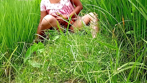 Solo female in a red dress and shorts enjoys rice bhabhi