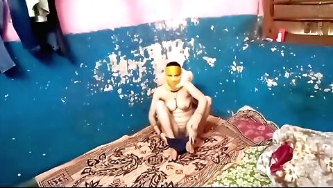 Indian hairy chick on the floor sucking a vibrator