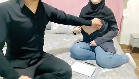 Busty indian amateur with a sexy ass giving a handjob