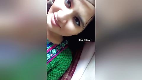 Webcam video of a little hottie fucking in the bed