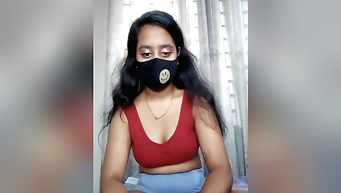 Sexy chick with a hot smile takes break in the kitchen