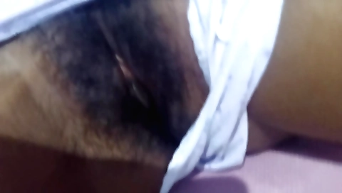 Indian hottie with a long body sucks her own pussy